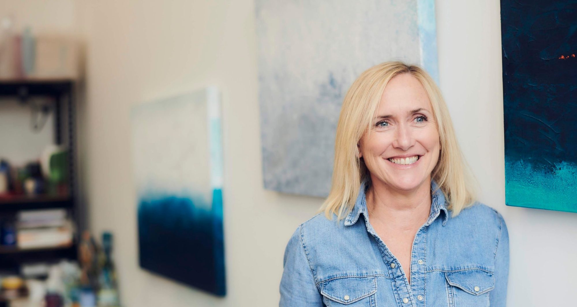 Emma, smiling, in her studio